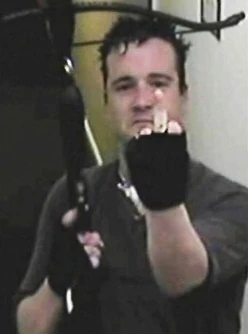 Stephen flipping off CCTV footage, which had previously captured the moment of him killing Suzanne Blamires.