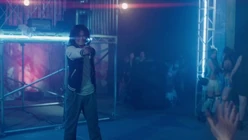 Aito holds Seger at gunpoint at the nightclub.