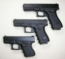 A Glock 17 (top) with a Glock 19 (middle) and Glock 26 (bottom).