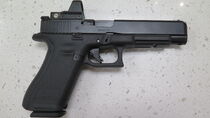 A Glock 34 with RMR sights.