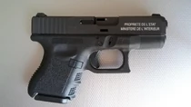 A Glock 26 with French writing on it.