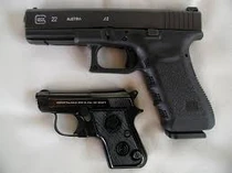 A Glock 22 and a Beretta 950.