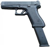 A Glock 18 with an extended magazine.