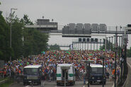 The mass is awaiting the starting shot on a motoryway, Berlin 2007.