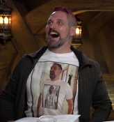 Travis as Sam Riegel from "Trial by Firelight" (3x02).[art 49]