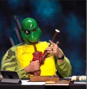 Travis as Orly Skiffback from "An Open Window" (2x114).[art 40]