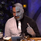 Travis as Two-Face from Batman: The Telltale Series from "Dark Bargains" (2x83).[art 32]