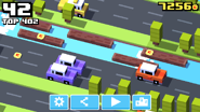 Cars running over a mascot