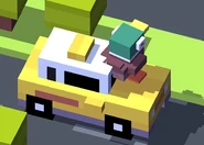 A Mallard on top of a yellow car