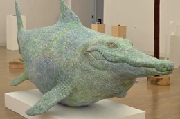  Statue of a crocodile-fish chimera created for artistic purposes unrelated to the fishdile.