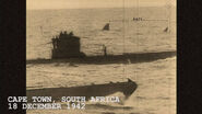 A photo, likely hoaxed, showing a megalodon of about 90ft long next to a U-boat. Disputed on the fact that there is no wake coming off the fins, and the Nazis did not watermark images with a swastika.