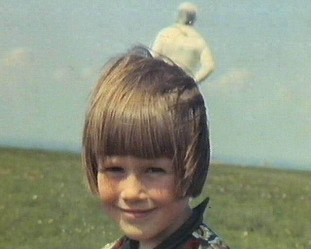 astronaut standing behind girl