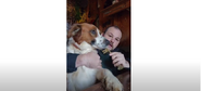 Lenwood S. Sharpe and his Harrier-Terrier Mix named Lucky. (Yes, this is his face reveal, and he's still alive and well.)