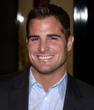 George Eads (as Nick Stokes)