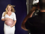 E4.webp (18 KB) Bare bump Procter getting her photo taken.