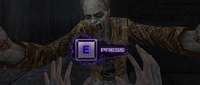 Press E to push the zombie