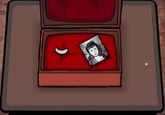 Ida's photo and egg in Rusty Lake: Roots.