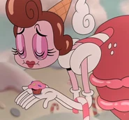 The Baroness eating cupcakes