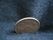 A reeded edged coin from 1952 to 1977.