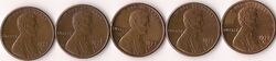 Five 1977-D Lincoln pennies