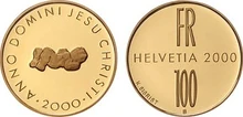 The 2000 coin, displaying an infant on the obverse.