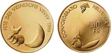 The 1999 commemorative coin.