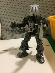 Romak brandishing his Soundwave Blades