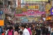 A crowded street in a small China Town neighborhood in Tamaku