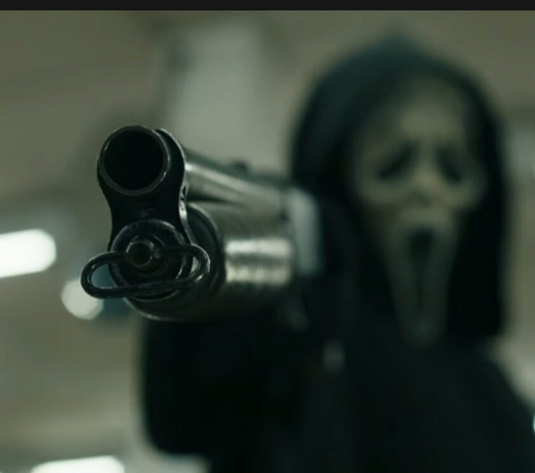 Watch Ghostface dodge bullets and wield a shotgun in a new Scream