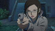 Misaki points her gun at Oreille.