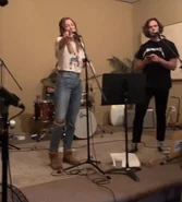 BTS of Riley Keough and Sam practicing their songs.