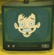 Dan smiling on a television video cassette.