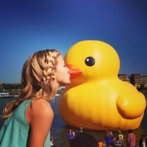 Paige Hyland kissing duck