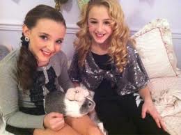 Kendall and Chloe with Kendall's guinea pig