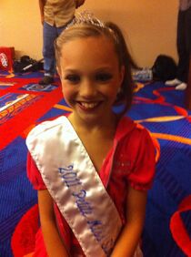 102 Maddie with crown and sash