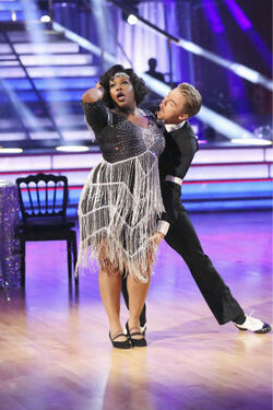 Glee star Amber Riley wears knee brace to Dancing With The Stars practise