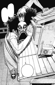 Reiko Kashima trying to lure Momo out of bed.