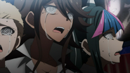 Ibuki and Akane Owari crying as they watch Chiaki dying on her execution.