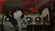 Komaru getting questioned by Genocide Jack.