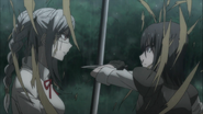 Despair Arc Episode 8 - Peko dodges Mukuro's swipes with her sword