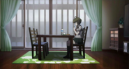 Komaru praying before eating breakfast.