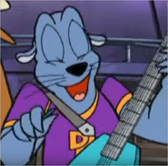 Sully playing an electric guitar.