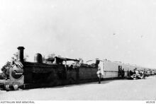 רכבת בית חולים - Palestine. c. 1916. A hospital train standing at a station waiting for patients to arrive. (Donor Royal Australian Army Medical Corps)