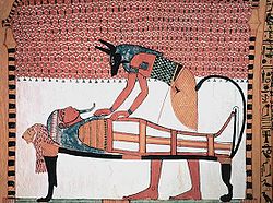 250px-Anubis attending the mummy of Sennedjem