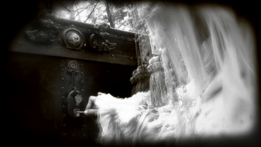 The girl tries to open the chest.