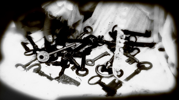 The girl collects some keys.