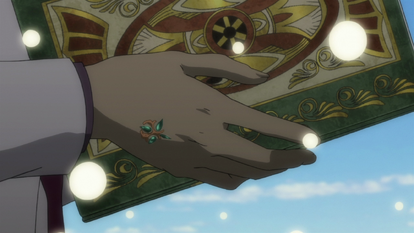 The key to the Rasiel's Bookshelf sealed inside the Professor's hand, as seen in the anime.