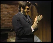 Quentin holding a Voodoo doll