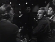 Frank Reich (approaching from bar, with uncredited extra Ann Ruggiero in background)_Blue Whale customer (uncredited)_ep199