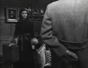 1949: Elizabeth confronts Paul over the Collins Family money he's stolen.